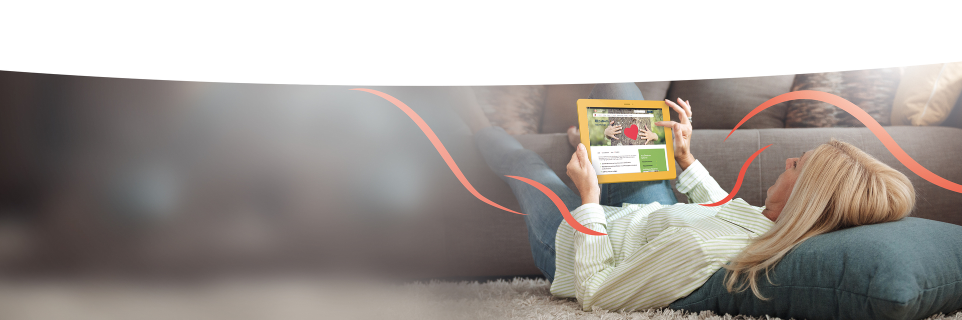 Frau mit Tablet auf dem Teppich