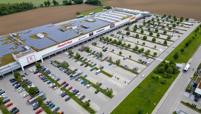 Luftbild InCenter in Landsberg am Lech Customer Story, InCenter, Fachmarktzentrum, Ladeinfrastruktur, E-Mobilität, Ladepark, Pfalzwerke
